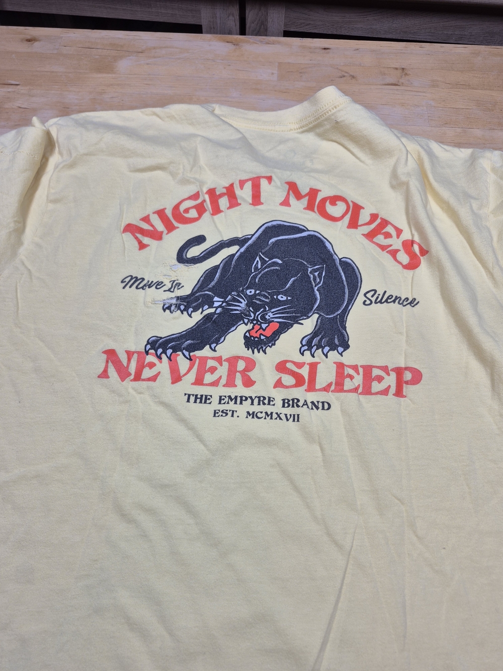 Empyre Yellow Tee with Black Panther and Red Lettering